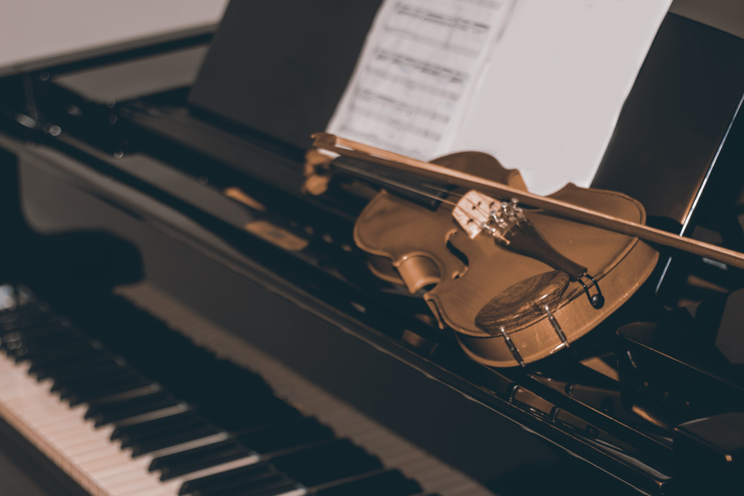 violin on piano for workshop about performance and competition opportunities